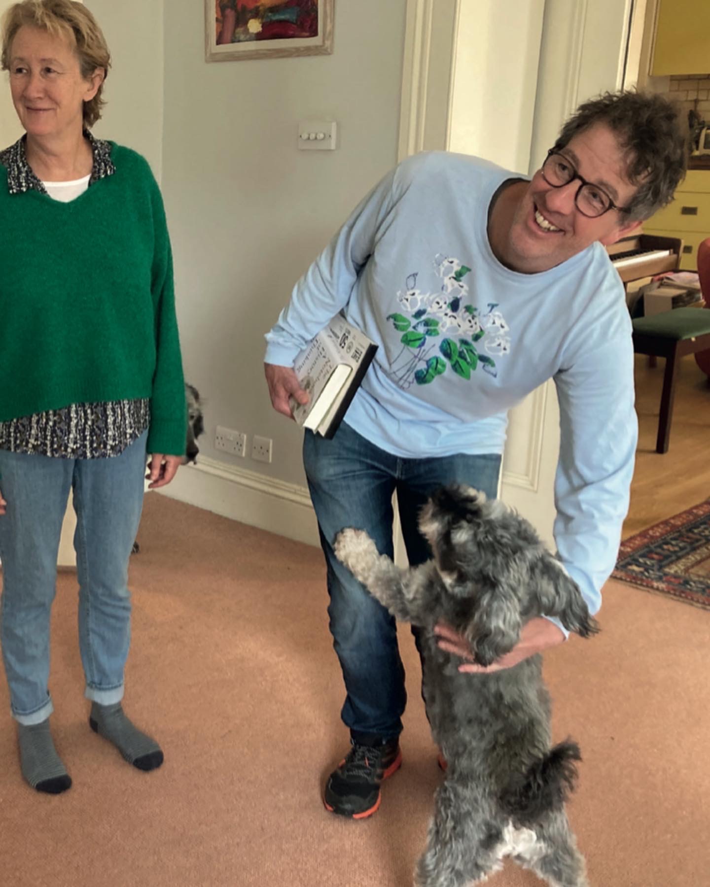 Saying goodbye. Nat, left, and schnauzer Peanut.