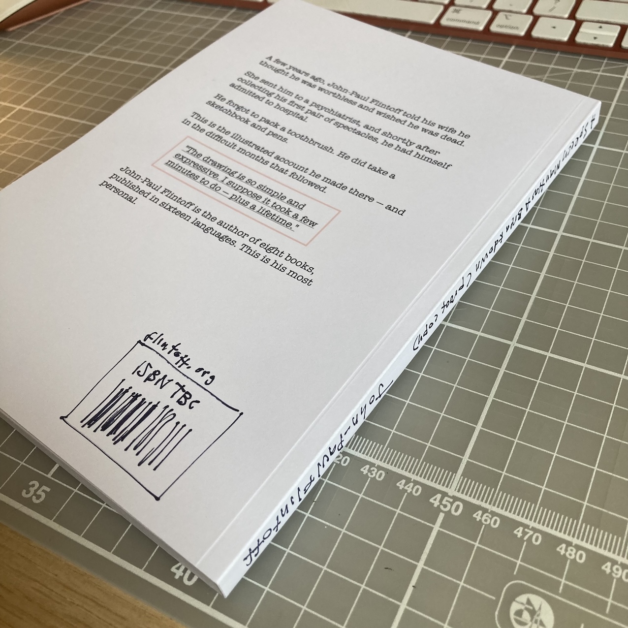 Roughly sketched ISBN with wonky bars, on back of the proof copy.