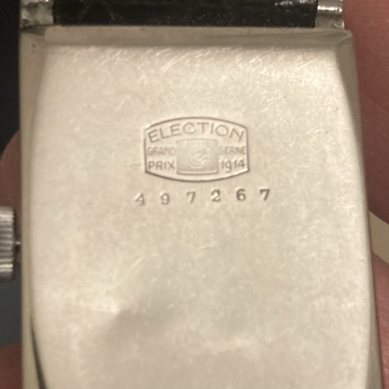 Back of the same watch, with words cut into the metal: Election, Grand Priz Berne 1914. Back of the same watch, with words cut into the metal: Election, Grand Priz Berne 1914.