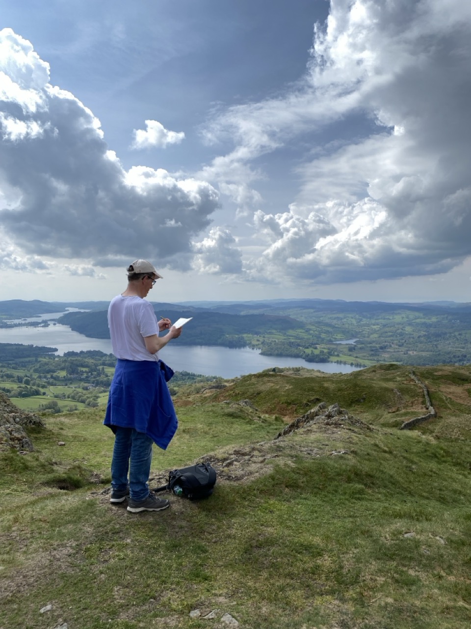 JPF drawing on a mountaintop above Windermere.