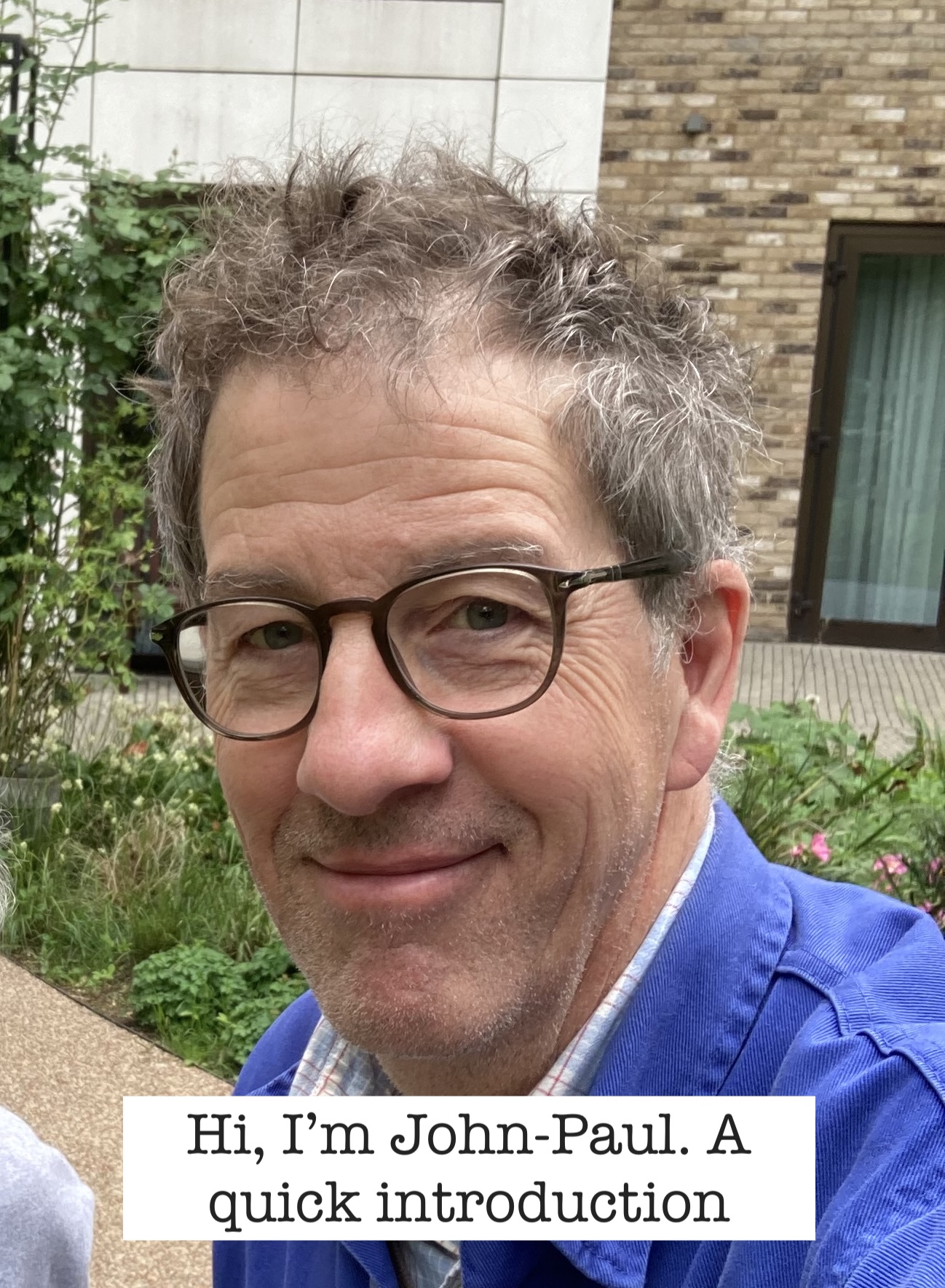 Portrait photo of JPF wearing blue jacket and smiling to camera, a selfie that was taken alongside someone else who is not actually visible in this picture, how tantalising! On top of the pic the words, "Hi I'm John-Paul. A quick introduction". Portrait photo of JPF wearing blue jacket and smiling to camera, a selfie that was taken alongside someone else who is not actually visible in this picture, how tantalising! On top of the pic the words, "Hi I'm John-Paul. A quick introduction".