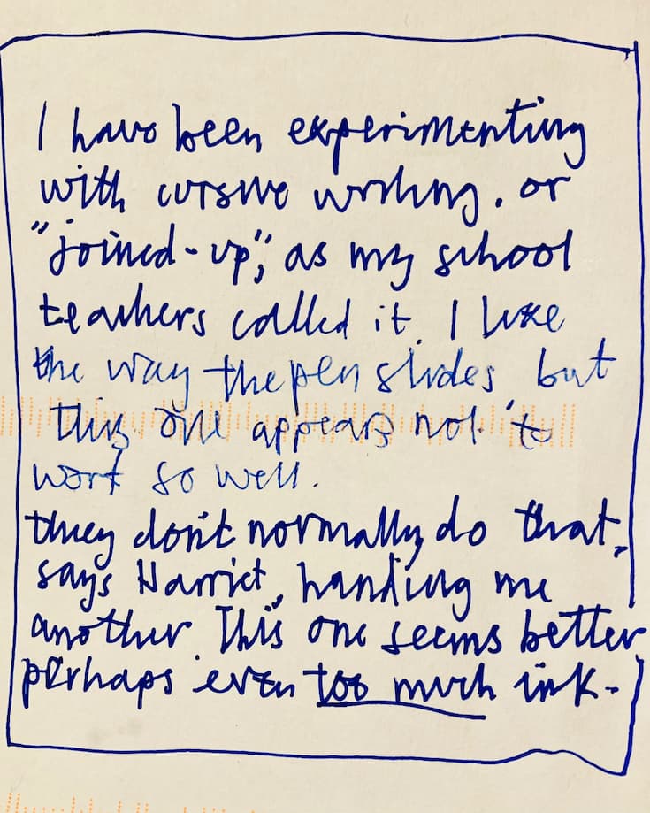 A photo of handwriting on lined paper.