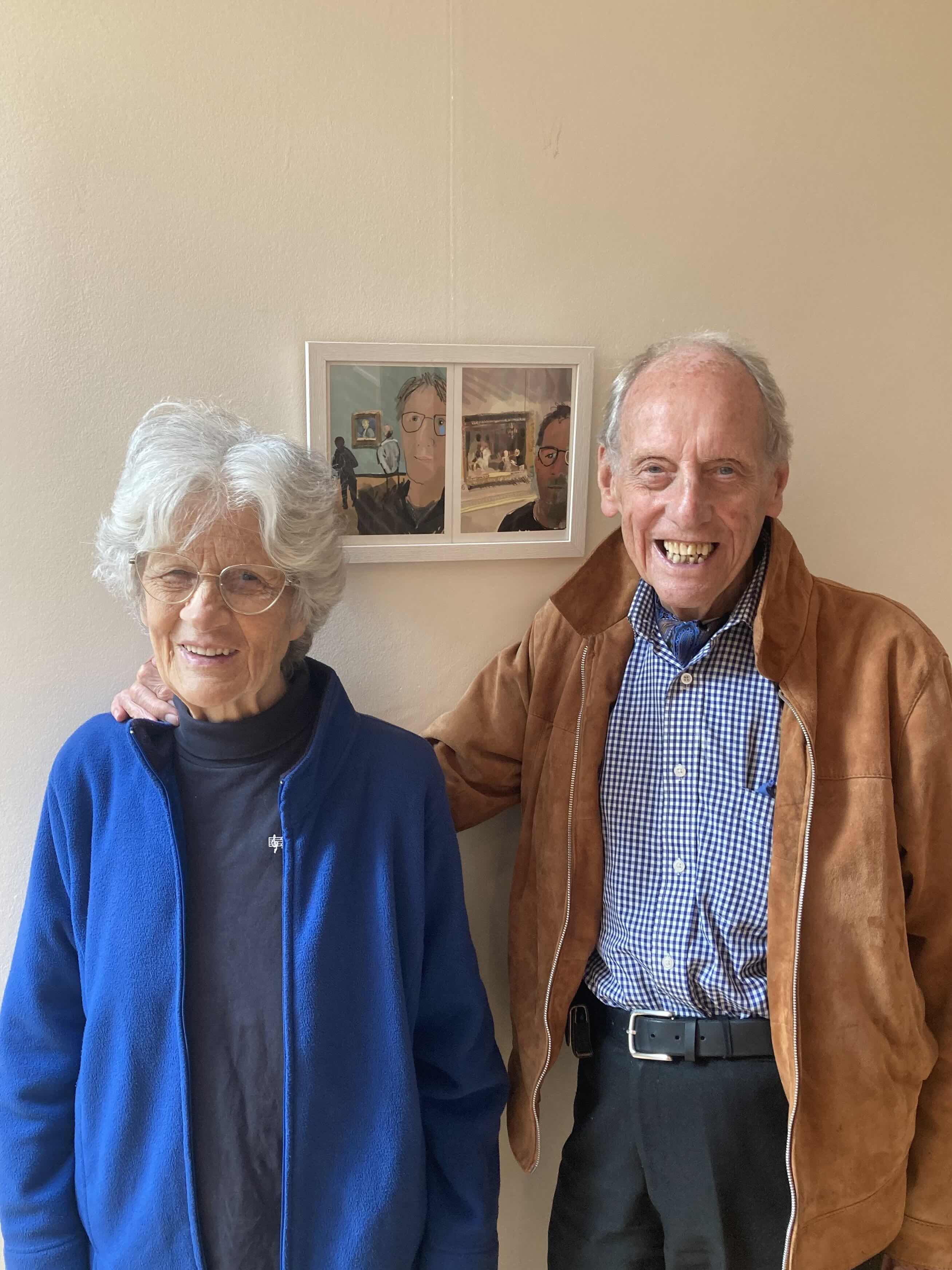 My mother and father stand smiling together beneath a small framed two-panel self-portrait print at Burgh House.