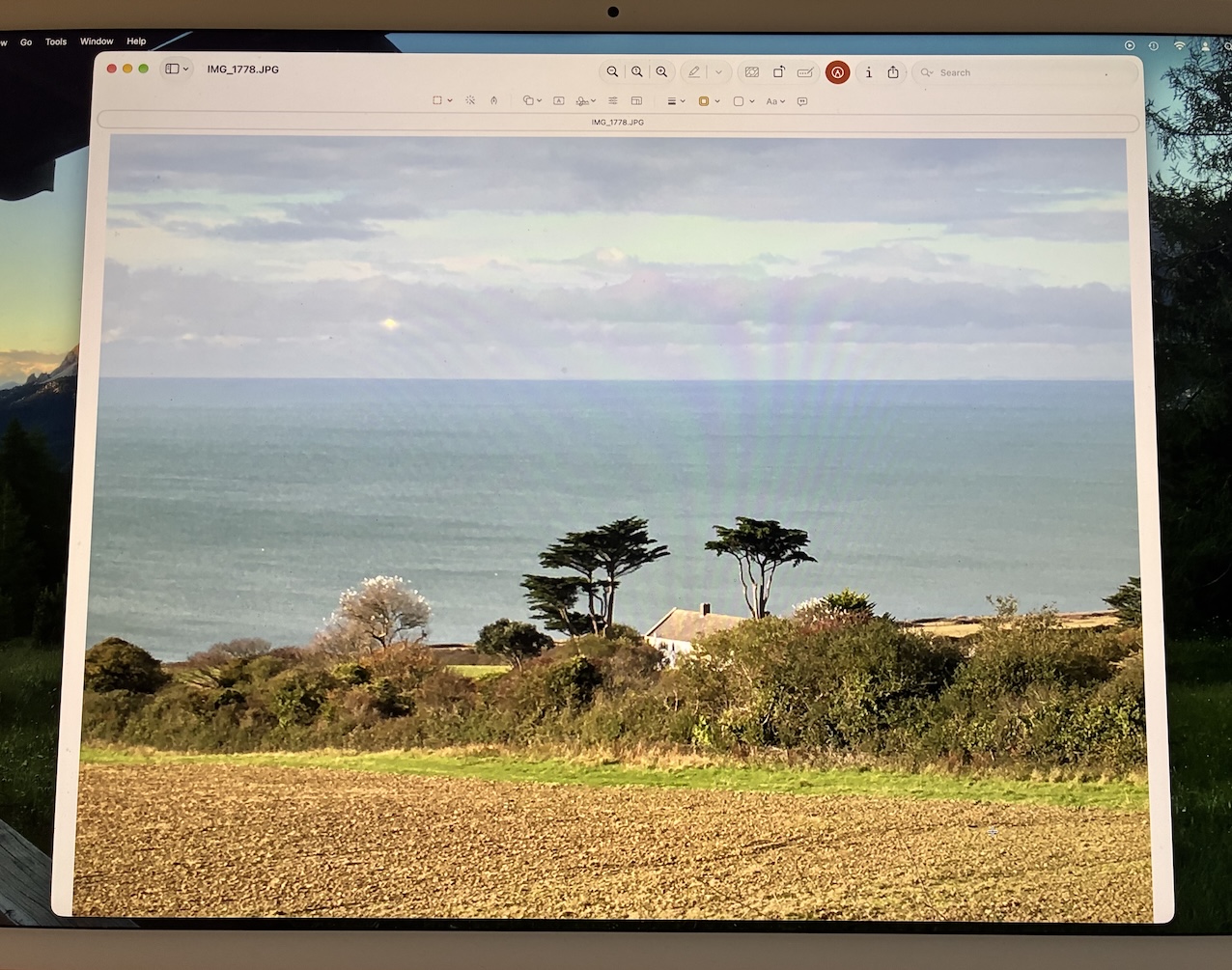 A wide sea-view photo open in the Preview app on a Mac A wide sea-view photo open in the Preview app on a Mac