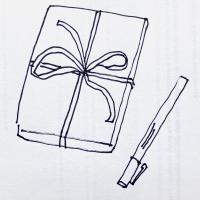 A wrapped parcel and pen